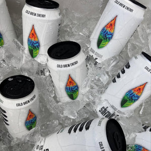 White energy drink containers with colorful labels on a bed of ice.
